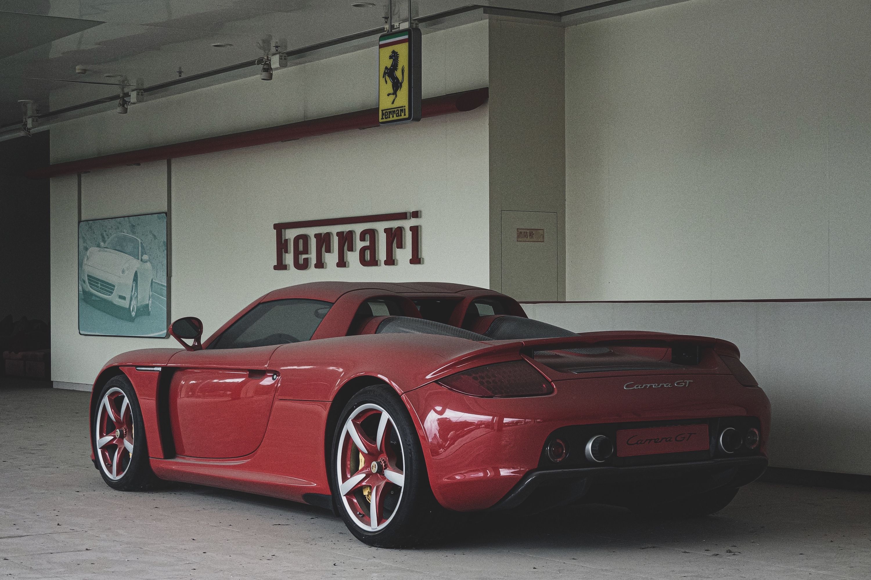 This Carrera GT Trapped in an Abandoned Chinese Dealership