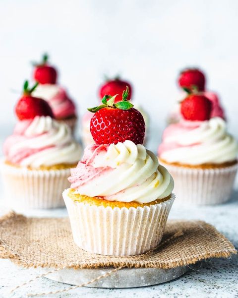 strawberry lemonade cupcakes with strawberry on top