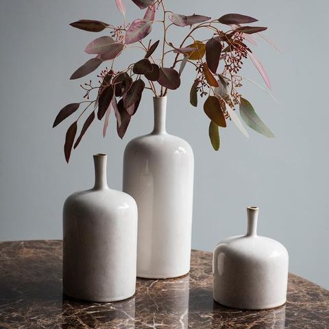 this set includes 3 natural vases