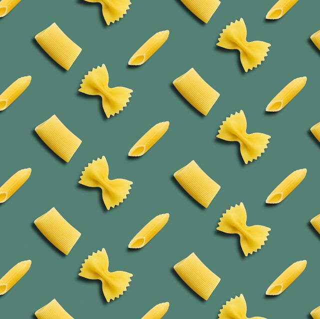 italian pasta pattern on a green background top view
