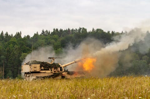 an army paladin m109a7 artillery system belonging to delta battery, 1st battalion, 5th field artillery regiment, 1st armored brigade combat team, 1st infantry division, fires rounds during a live fire exercise on a range at grafenwoehr training area, germany, aug 6, 2019 the 1 5 fa is participating in combined resolve xii, a multinational exercise designed to increase the readiness of allied forces during atlantic resolve us army photo by sgt jeremiah woods