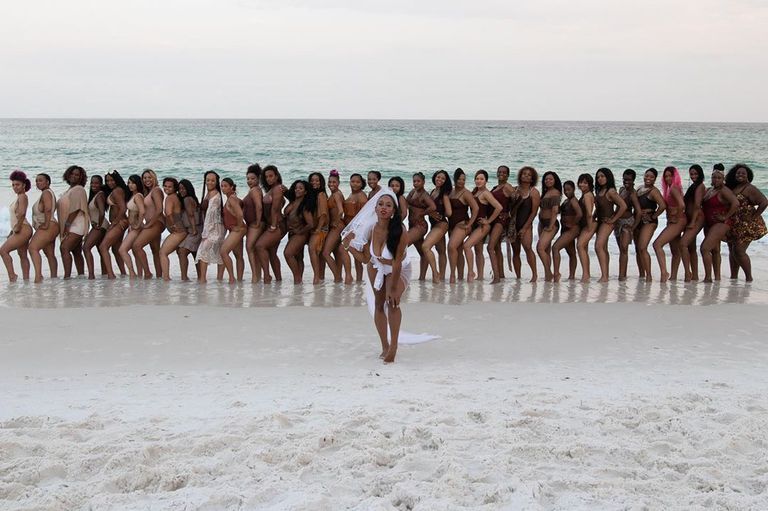 bride with 34 bridesmaids