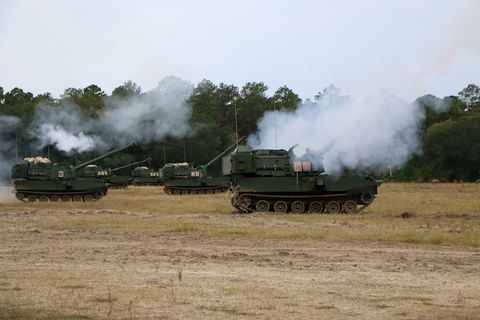 Modernized Paladin M109A7 Howitzers, assigned to the 'Kings of War Battalion', 1st Battalion, 9th Field Artillery Regiment, 2nd Armored Brigade Combat Team, 3rd Infantry Division, conduct firing sequences during field qualifications artillery table vi platoon level as part of the culminating exercise in operator new equipment training at fort stewart, georgia on november 5, 2021 the 'spartan brigade', 2nd abct, 3rd id, is the tip of the spear in the division's downhill path to becoming the most modernized division in the US Army by summer 2023 US Army photo by Sergeant Trenton Lowery