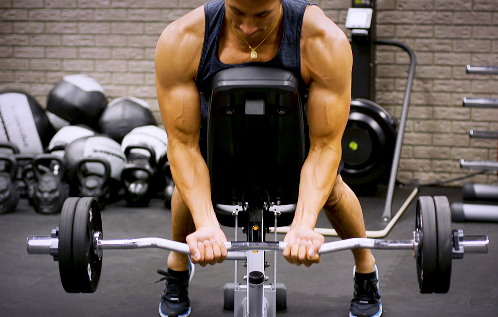 Perfect Your Biceps With The Ez Bar Spider Curl Men S Health