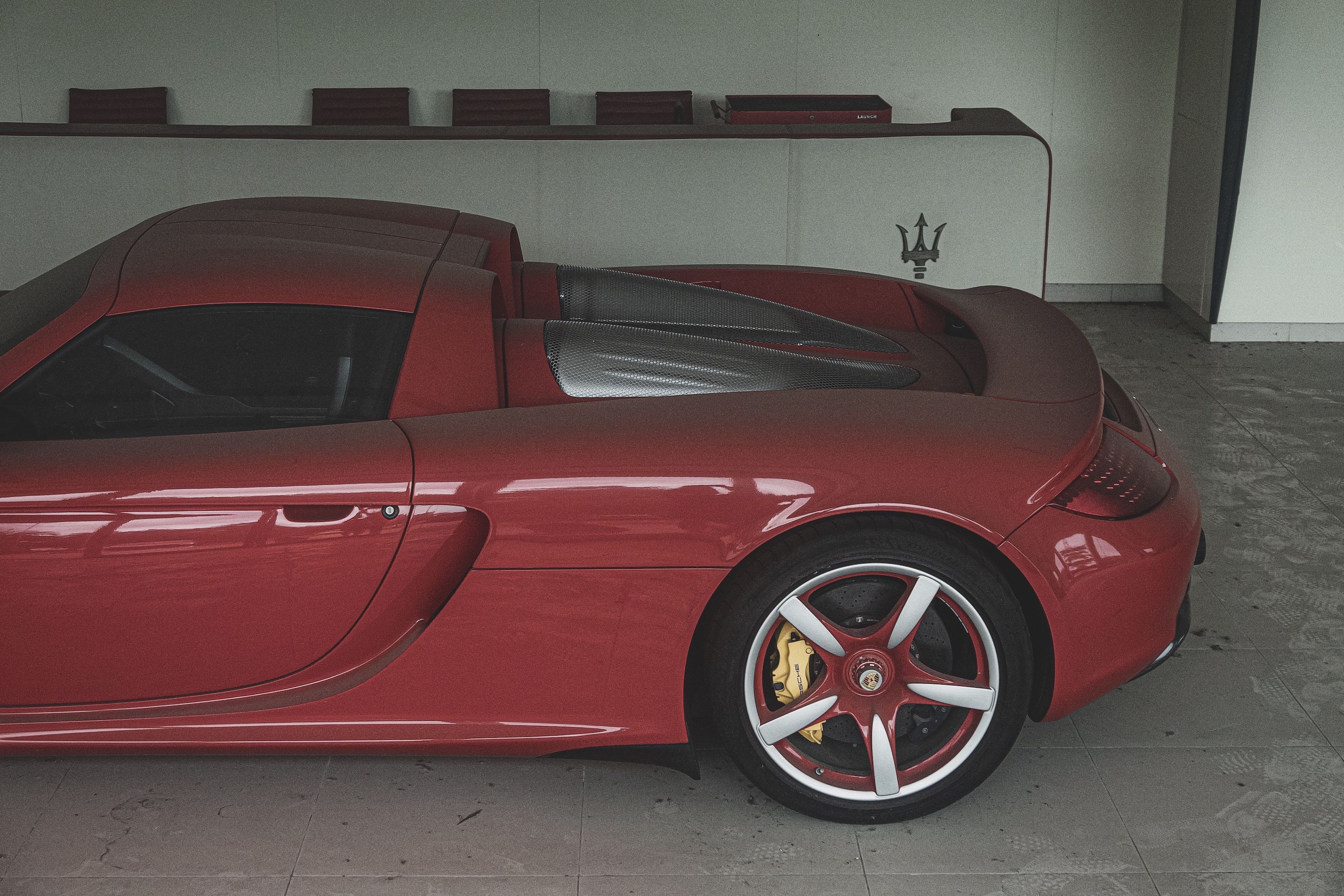 This Carrera GT Trapped in an Abandoned Chinese Dealership