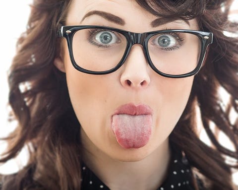 The Right Way To Clean Your Tongue And How Often You Should Do It