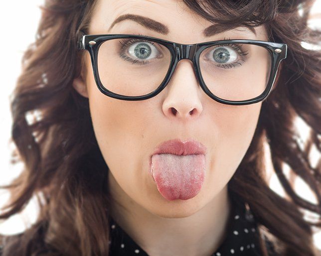 The Right Way To Clean Your Tongue And How Often You Should Do It