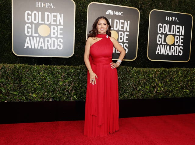NBC's "78th Annual Golden Globe Awards" - Red Carpet Arrivals salma hayek posing on the nbc 78th annual golden globe awards red carpet