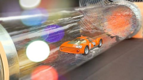 using a wind tunnel to highlight a painting of a porsche 906