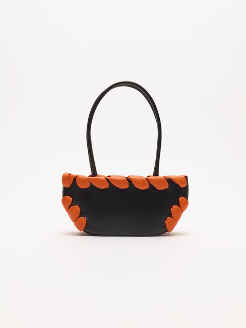 black bag with orange stitching