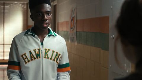 lucas talks to max in a hallway in a scene from stranger things' fourth season