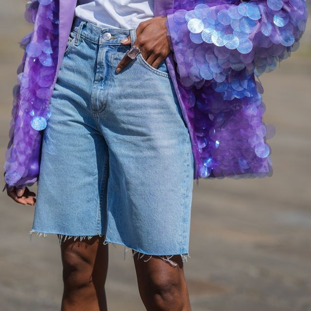 paris, france may 23 emilie joseph infashionwetrust wears matching crystal ring, white t-shirt, pale purple oversized longline blazer jacket with attico embroidered plastic round shiny sequins, faded blue denim jeans dad shorts mango, on may 23, 2021 in paris, france photo by edward berthelotgetty images