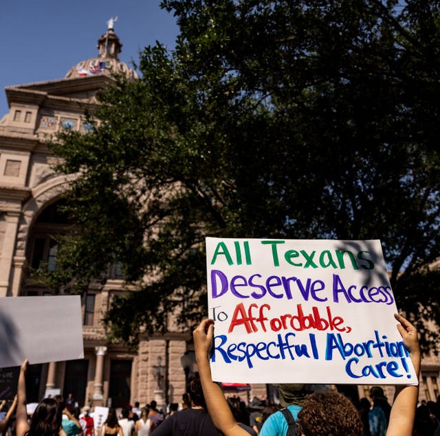 a protest sign that reads all texans deserve access to affordable, respectful abortion care