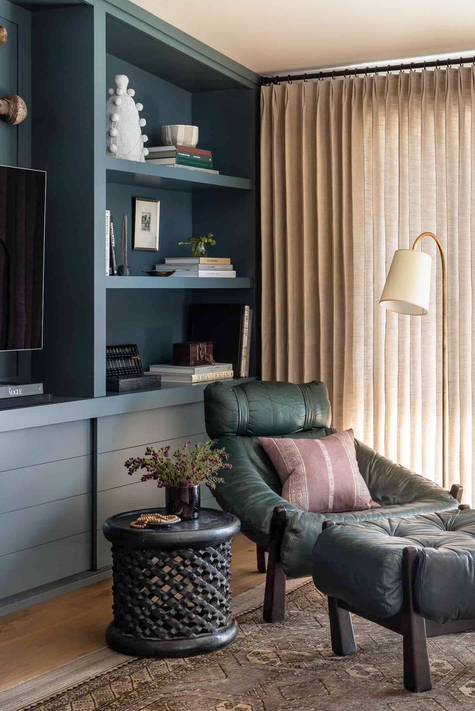 accent wall 25 Rooms That Prove You Need an Accent Wall in Your Home accent walls heidi caillier design seattle interior designer olympic manor house modern traditional custom blue built ins bookshelves styling vintage leather chair brass lamp drapes mid century 1582662764