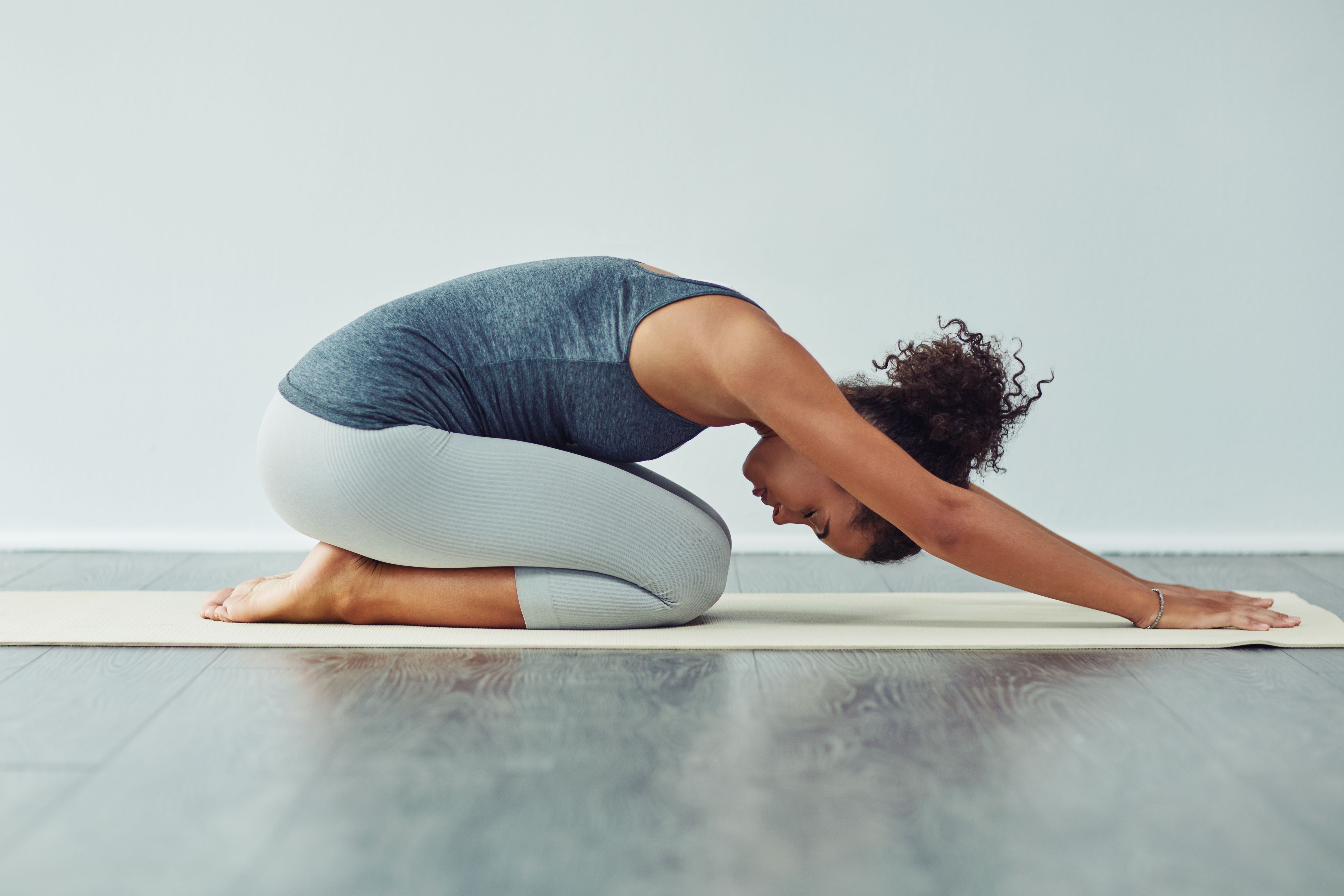 5 Yoga Poses for Upper Back Pain — YOGABYCANDACE