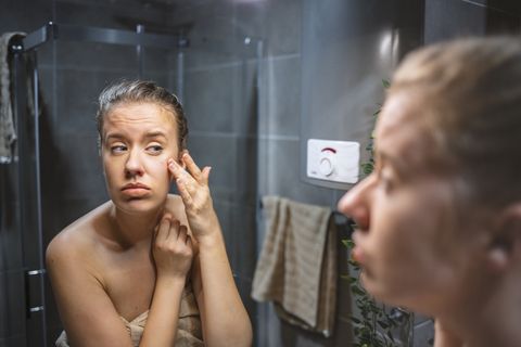 acne spot pimple spot skincare beauty care girl pressing on skin problem face
