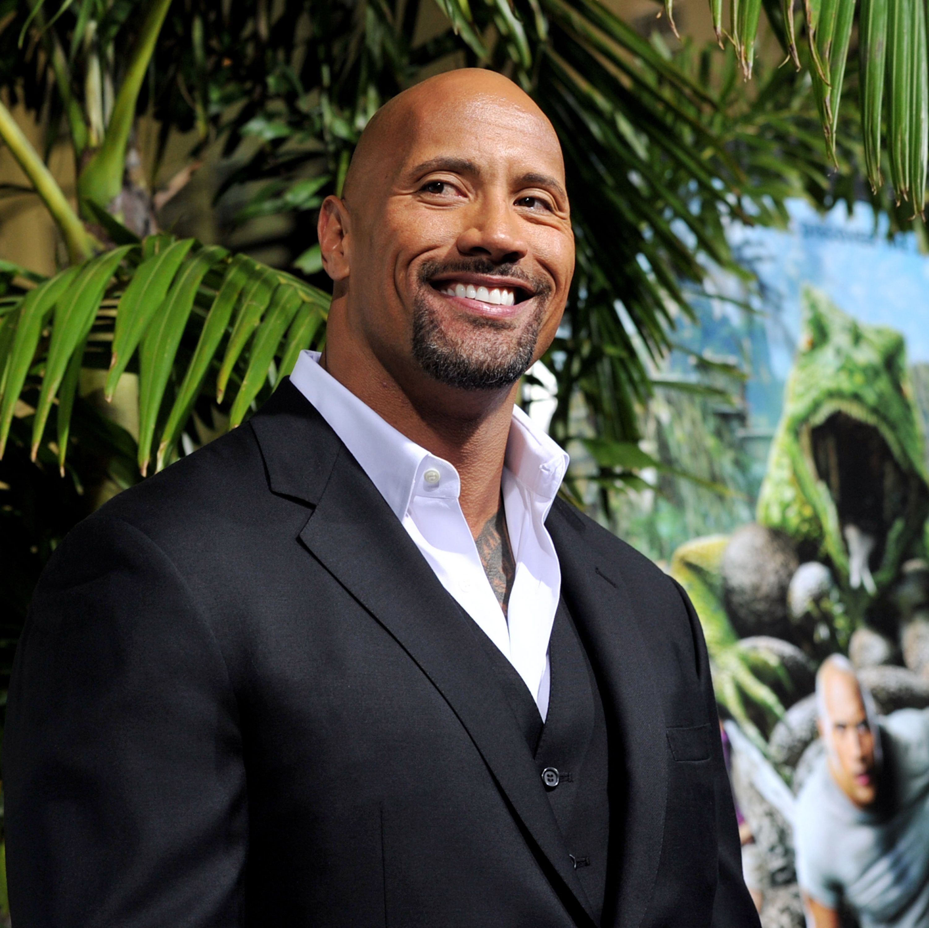 Watch The Rock Surprise His Mom with a New Car for Christmas