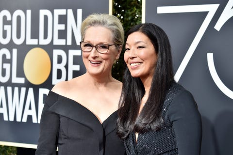 a photo of meryl streep and ai jen poo on the red carpet at the golden globes