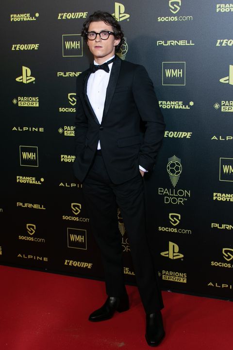 tom holland posing separately at the ﻿﻿ballon d'or event