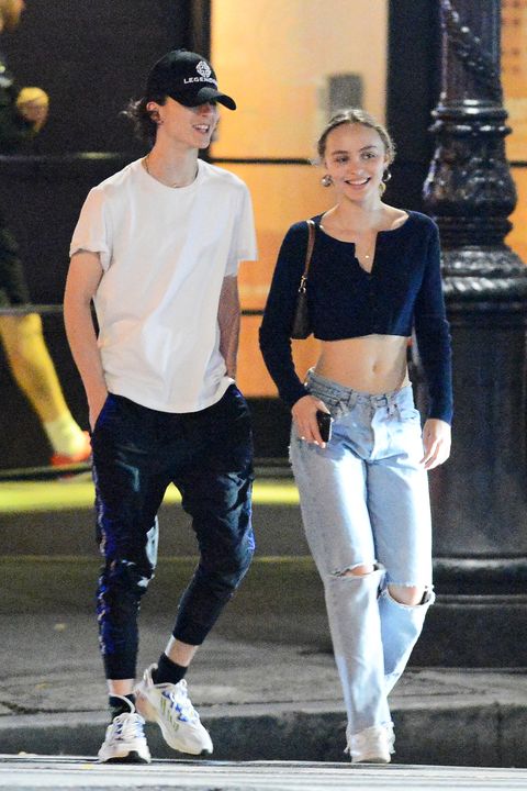 09232019 exclusive timothee chalamet and lily rose depp step out for an evening together in new york city the 20 year old model and actress wore a black crop top, ripped jeans, and white trainers chalamet, 23, wore a baseball cap, t shirt, black sweats, and white trainers salestheimagedirectcom please bylinetheimagedirectcomexclusive please email salestheimagedirectcom for fees before use