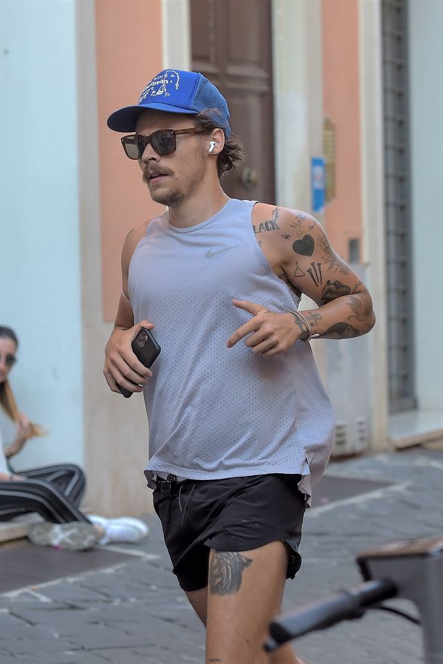 exclusive no web until 2330 bst 1st aug harry styles sports new facial hair while jogging in rome 24 jul 2020 pictured harry styles photo credit mega themegaagencycom 1 888 505 6342