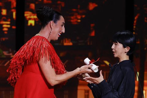the 75th cannes film festival   closing ceremony   cannes, france, may 28, 2022 director chie hayakawa receives the camera dor award special mention for the film plan 75, from rossy de palma, president of the camera dor jury reuterseric gaillard