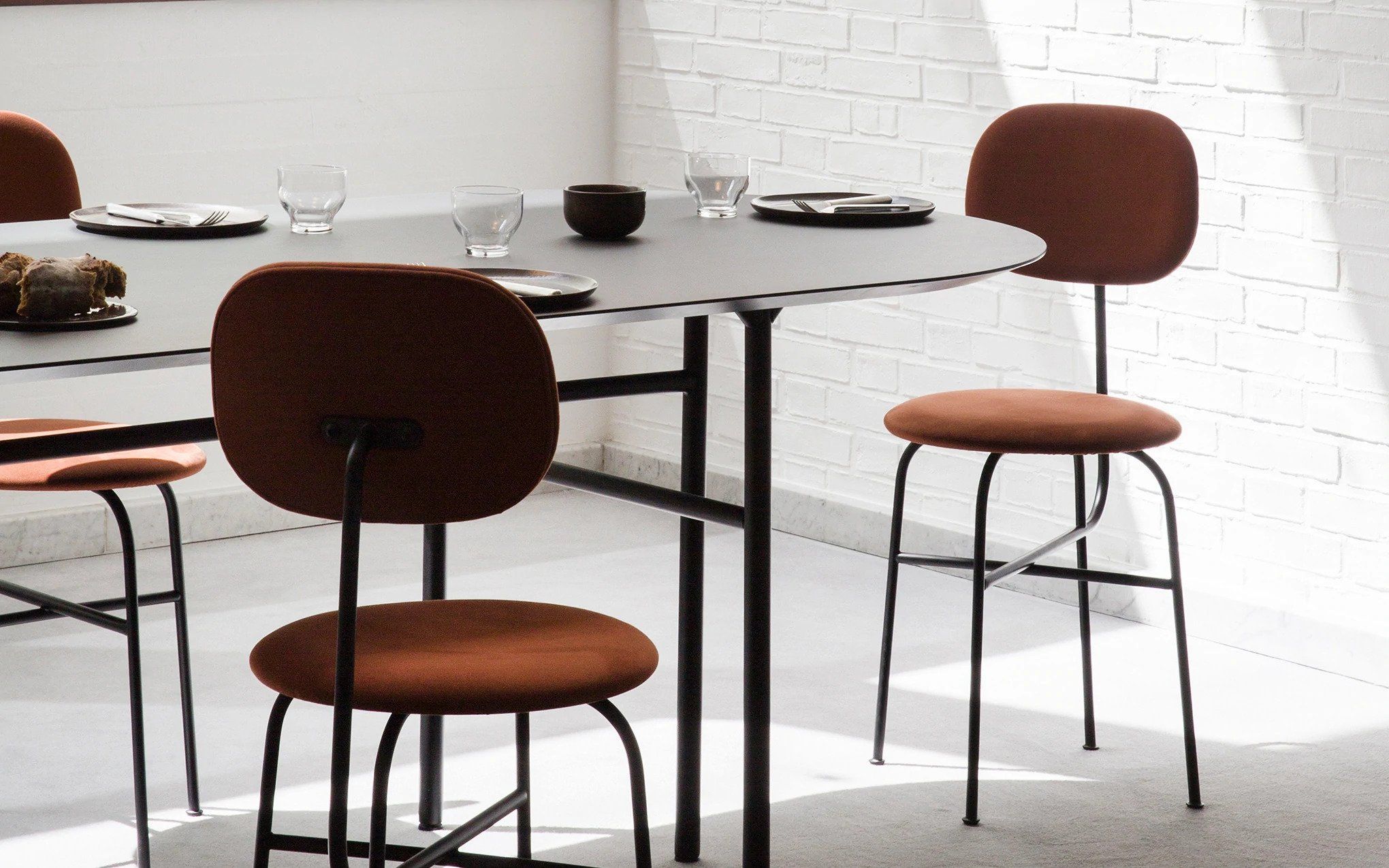 grey bar stools and table