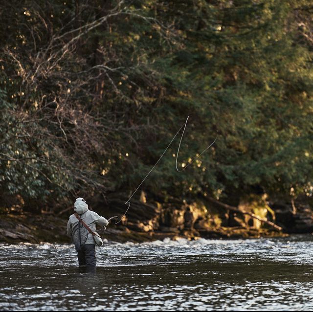 aime x woolrich fisherman in a river