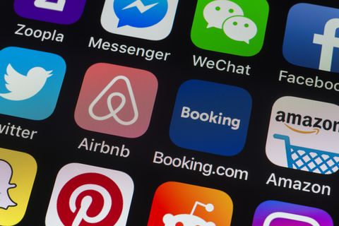 Airbnb, Booking.com and other phone Apps on iPhone screen