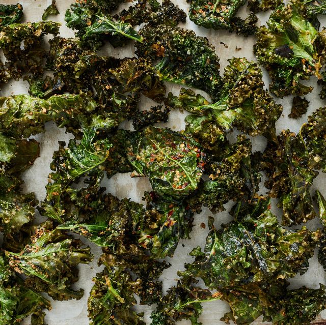 air fried kale chips topped with parmesan and red pepper flakes