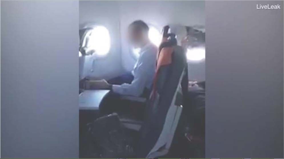 Man masturbates on plane.