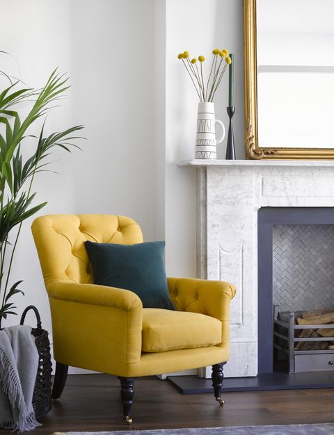 alcove ideas, mustard yellow armchair in nook of living room
