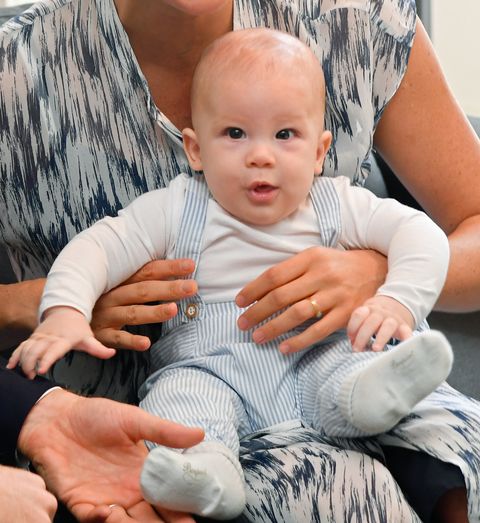 archie, seen here on mum meghan's lap during a tour in africa, is one years old today these are all the birthday messages other royals have sent him