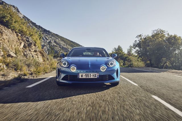 alpine a110 driving on the road