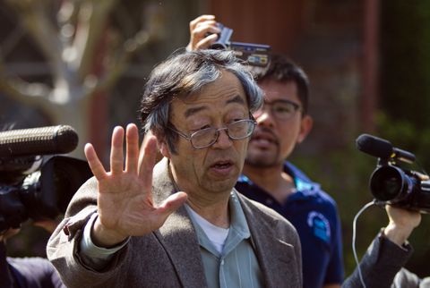 temple city, ca march 6, 2014 journalists surround satoshi nakamoto, the mythical bitcoin creator, as he walks from his home to a car in tempe city thursday, march 6, 2014 photo by allen j schabenlos angeles times via getty images