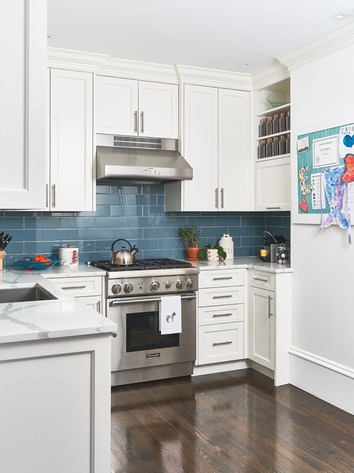 kitchens with white cabinets and backsplashes