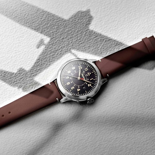 pilot watch with airplane shadow