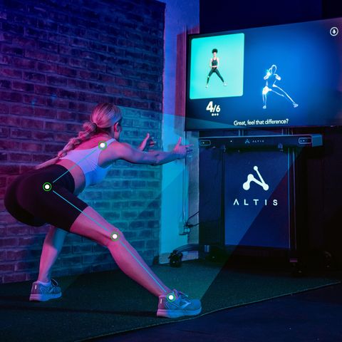 woman using the altis system to work out