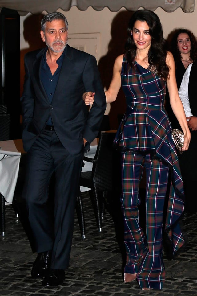 Amal Clooney looks impossibly chic in peplum plaid for night out in Rome