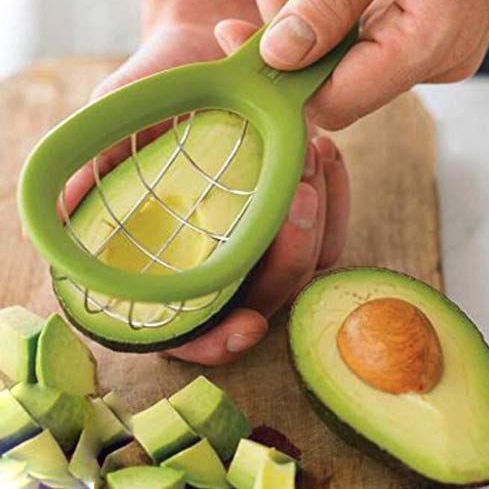 avocado slicer and hand with rings