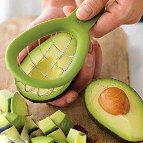 avocado slicer and hand with rings