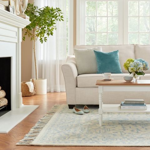 Living room, Furniture, Room, Floor, Interior design, Property, Coffee table, Tile, Table, Flooring, 