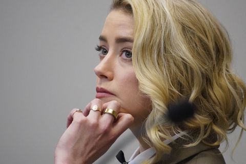 actor amber heard listens in the courtroom at the fairfax county circuit courthouse in fairfax, virginia, on may 23, 2022 us actor johnny depp sued his ex wife amber heard for libel in fairfax county circuit court after she wrote an op ed piece in the washington post in 2018 referring to herself as a public figure representing domestic abuse photo by steve helber pool afp photo by steve helberpool afp via getty images