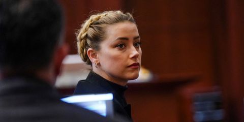 us actress amber heard looks over he shoulder during the 50 million us dollars depp vs heard defamation trial at the fairfax county circuit court in fairfax, virginia,on april 14, 2022   heard is being sued for defamation by her former husband, us actor johnny depp, after she wrote an op ed in the washington post in 2018 that, without naming depp, accused him of domestic abuse photo by shawn thew  pool  afp photo by shawn thewpoolafp via getty images