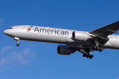 American Airlines Boeing 777-300 with registration N717AN is...