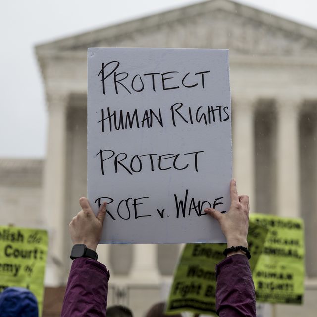 protest sign that reads protect human rights protect roe v wade