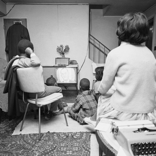 african american family watching president johnson on tv