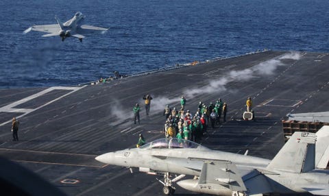 conducts carrier qualification training aboard the uss nimitz