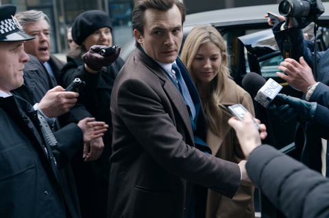 rupert friend and sienna miller dodge paparazzi attention in the netflix series anatomy of a scandal