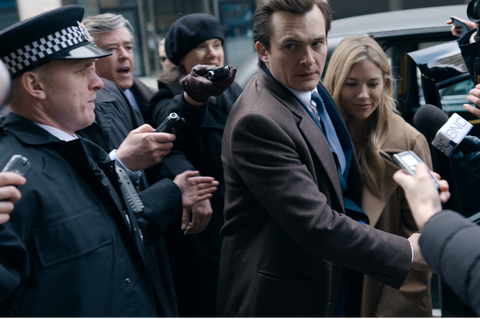 rupert friend and sienna miller dodge paparazzi attention in the netflix series anatomy of a scandal